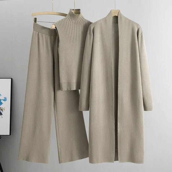 Caitlin three-piece layered pants set by Bennett and Lowe featuring stylish matching top, pants, and layered accessories in neutral tones.