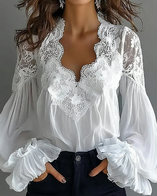 Elegant floral lace blouse with scalloped V-neck and lantern sleeves by Bennett and Lowe, featuring intricate floral details.