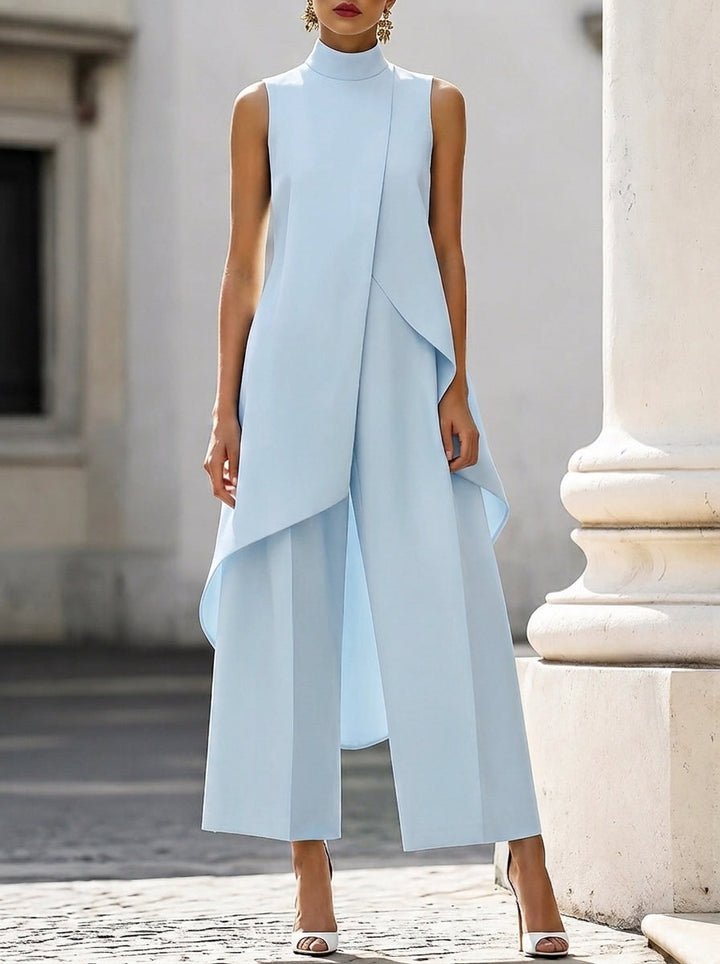 Martina high-neck wide-leg jumpsuit by Bennett and Lowe, shown on a model with a fitted top and flowing pant legs.