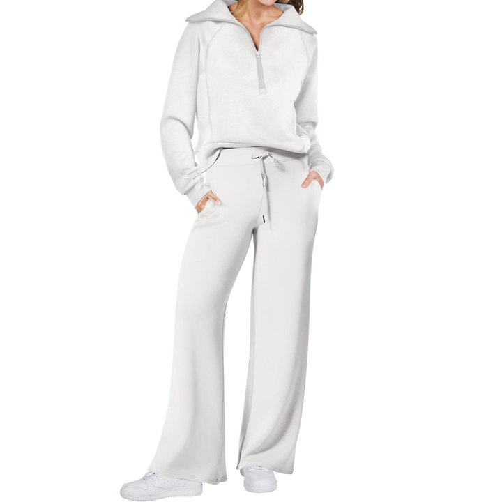 White Maya two-piece set for women featuring a half-zip pullover and wide-leg pants by Bennett and Lowe.