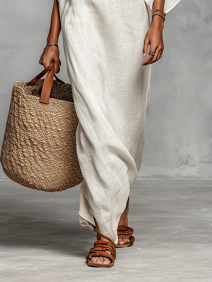 Aveline off-shoulder batwing maxi dress for women in yellow, flowing fabric with relaxed fit and stylish neckline.