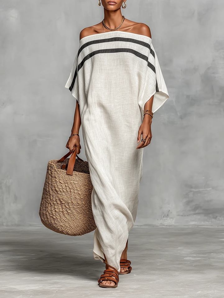 Aveline off-shoulder batwing maxi dress for women in soft yellow, flowing fabric, with a relaxed, elegant silhouette by Bennett and Lowe