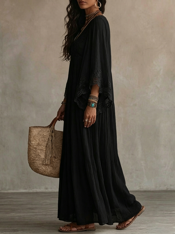 Black lace batwing maxi dress for women by Bennett and Lowe, featuring elegant flowing fabric and detailed lace design.