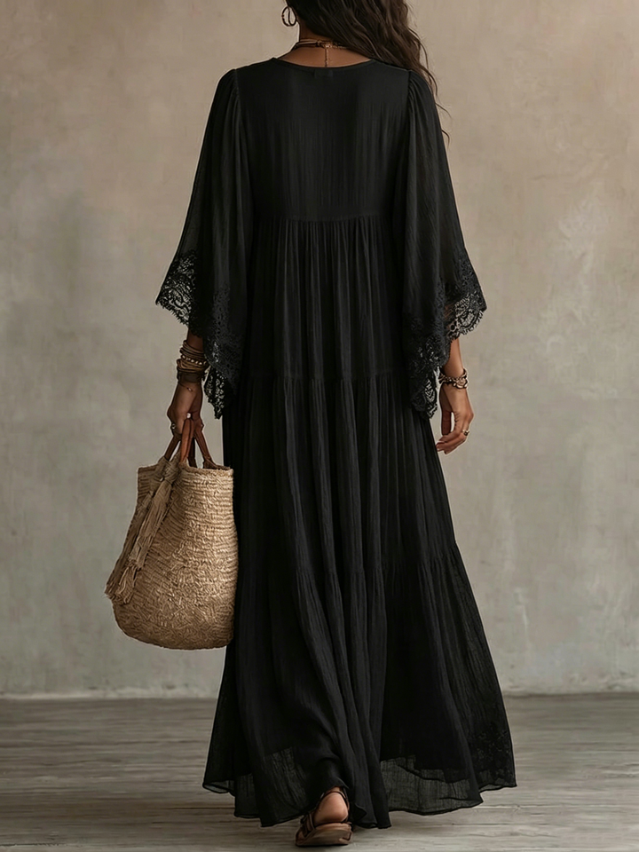 Black lace batwing maxi dress for women by Bennett and Lowe, featuring elegant lace details and flowing silhouette.