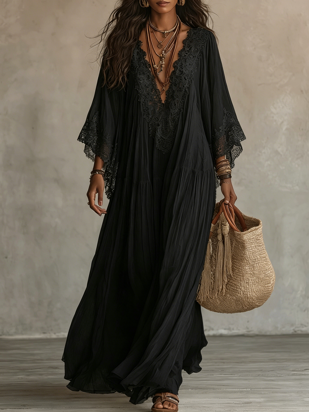 Black lace batwing maxi dress for women by Bennett and Lowe, featuring elegant flowing fabric and intricate lace details.