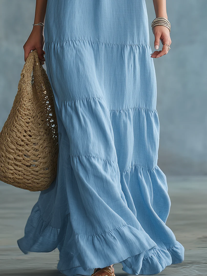Bohemian V-neck maxi dress for women by Bennett and Lowe, featuring flowy fabric and boho style in a vibrant pattern.
