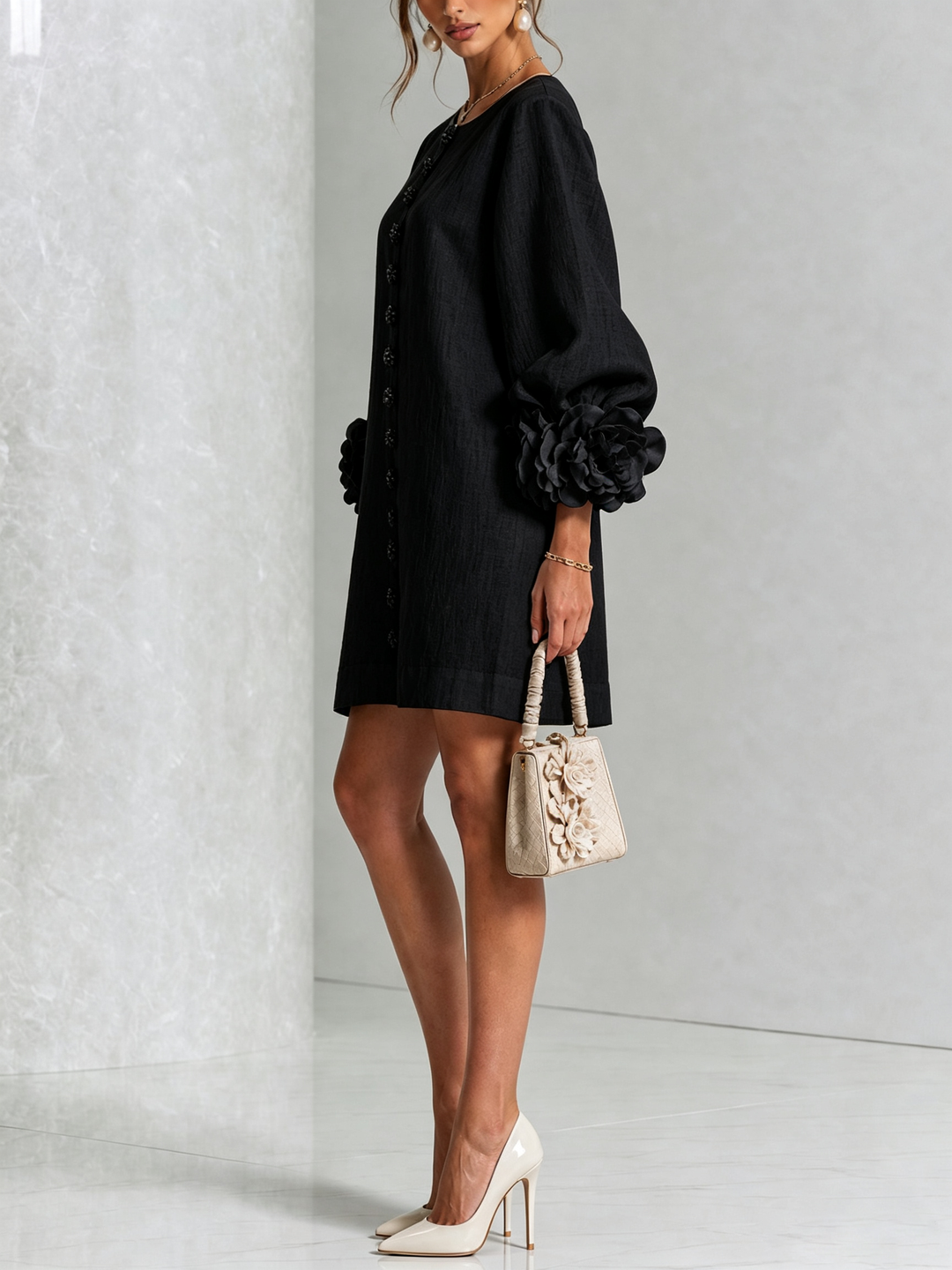 Black Henrietta™ Floral Button-Down Mini Dress by Bennett and Lowe, featuring a fitted silhouette and floral print.