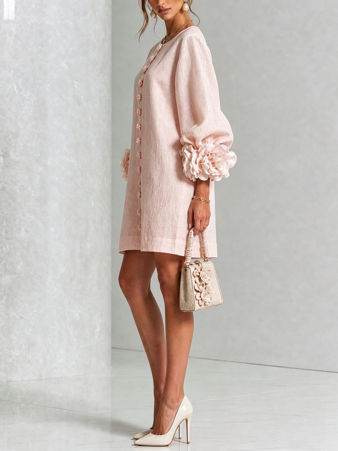 Pink Henrietta™ Floral Button-Down Mini Dress by Bennett and Lowe, featuring a fitted bodice and floral pattern.