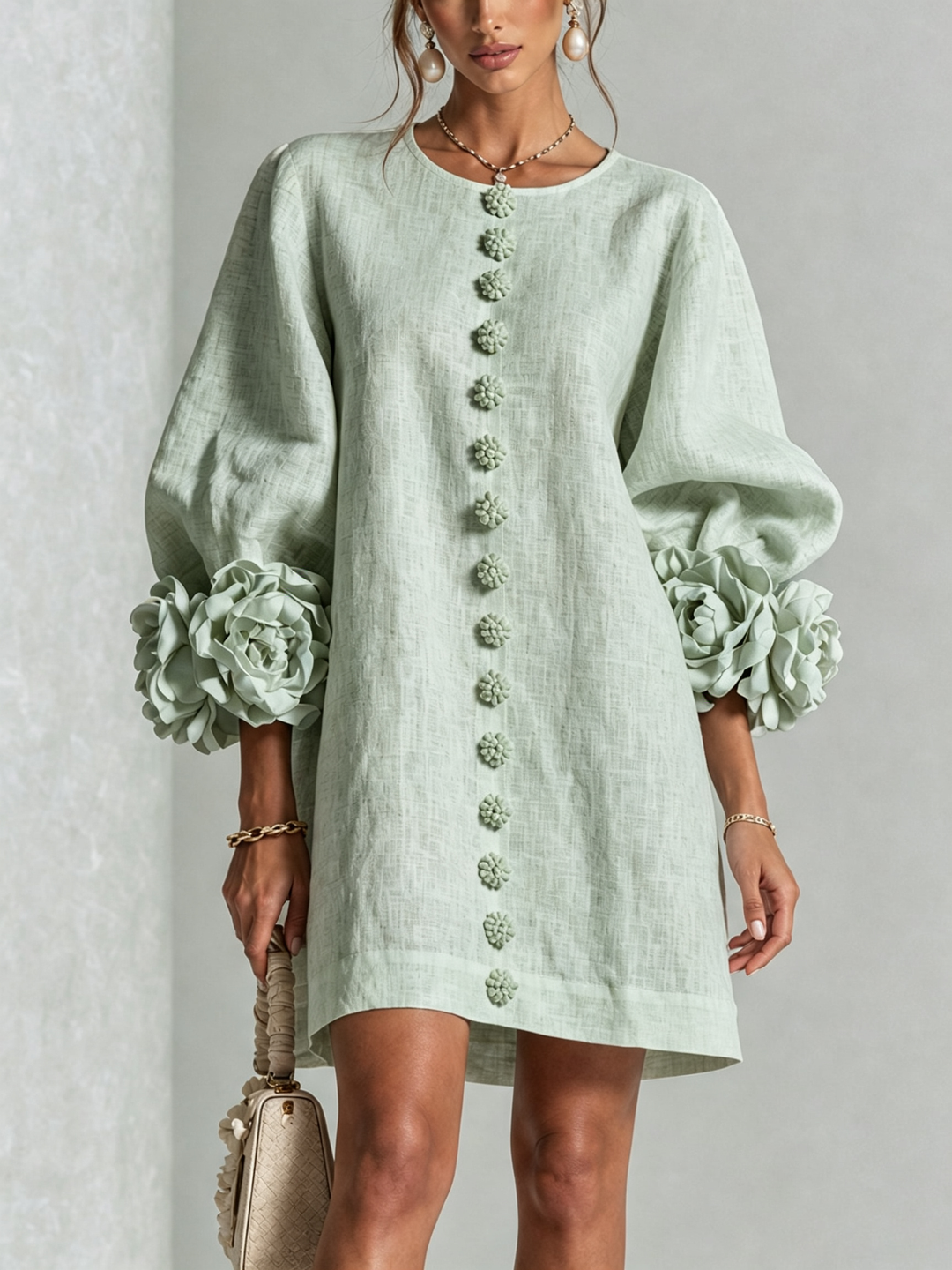 Henrietta™ Floral Button-Down Mini Dress in Sage Mist by Bennett and Lowe, featuring a v-neck, long sleeves, and floral pattern.