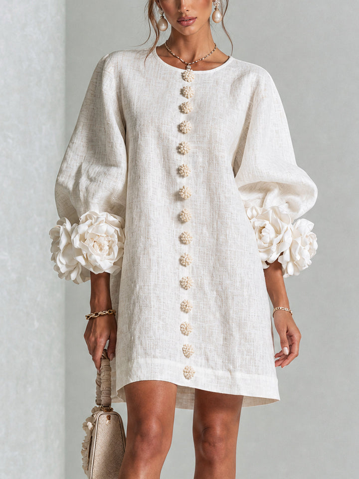 Henrietta™ Floral Button-Down Mini Dress by Bennett and Lowe, featuring a vibrant floral pattern and classic collar design.