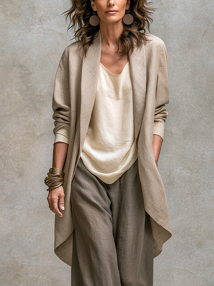 Simone Bennett and Lowe layered three-piece wide-leg matching set with flowing fabric and coordinated top, pants, and jacket.