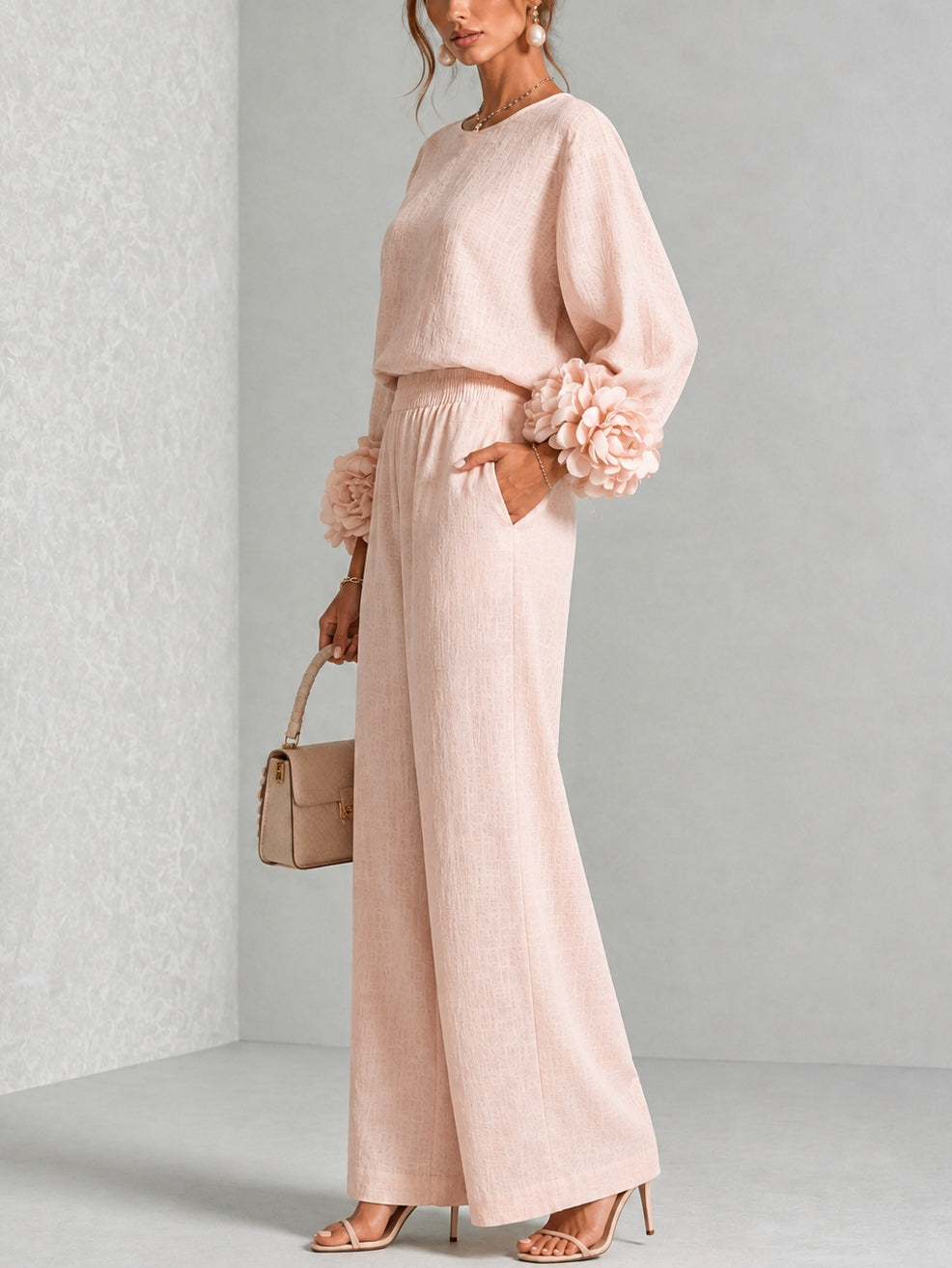 Pink Yolanda™ Ruffle Cuff Two-Piece Set by Bennett and Lowe featuring ruffled cuffs and a stylish, coordinated top and bottom.