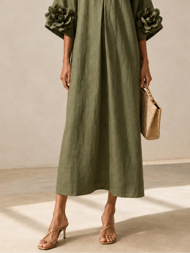 Flowy maxi dress by Bennett & Lowe with rose-cuff sleeves, featuring a relaxed fit and elegant design, shown on a model.
