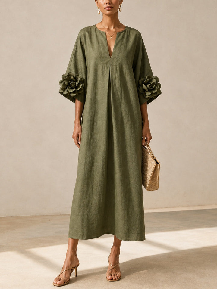 Juniper Bennett & Lowe flowy maxi dress with rose-cuff sleeves, lightweight fabric, and elegant silhouette for a stylish look.