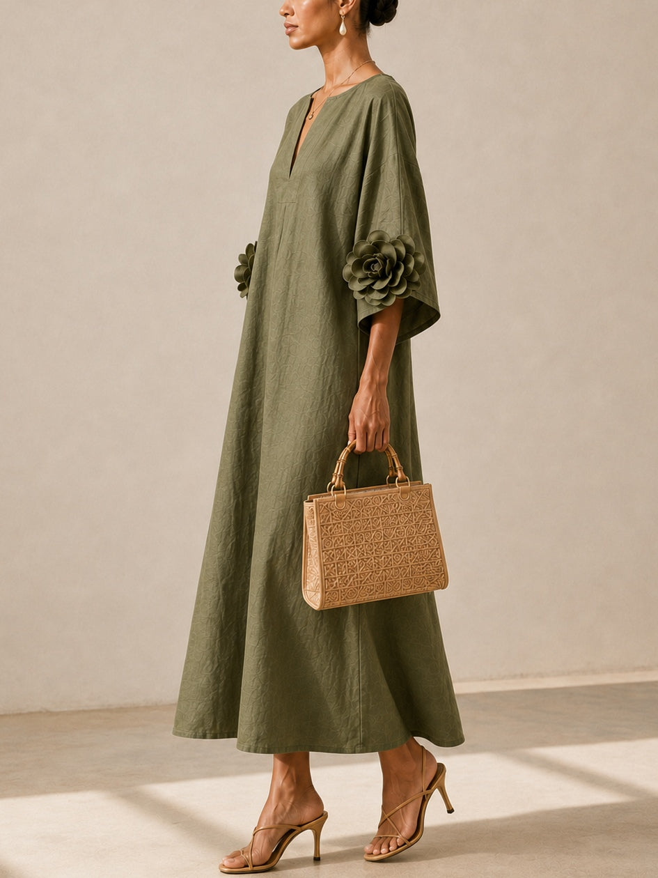 Juniper Bennett & Lowe flowy maxi dress with rose-cuff sleeves, lightweight fabric, and elegant silhouette.