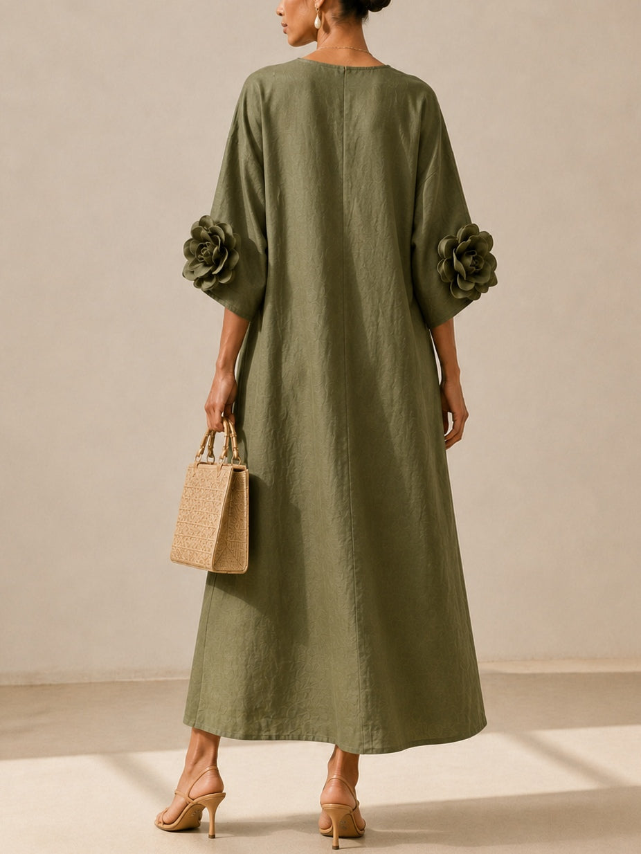 Juniper Bennett & Lowe flowy maxi dress with rose-cuff sleeves, soft fabric, and elegant silhouette in a stylish design.