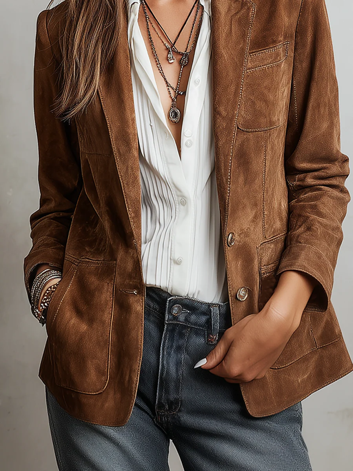 Brown tailored women's blazer with contrast stitching from Bennett and Lowe Verona collection, featuring structured fit and lapel collar.