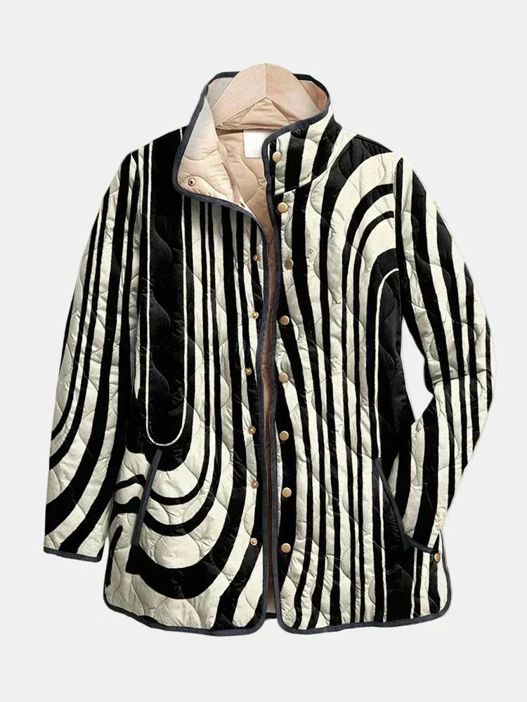 Evangeline geometric-print quilted jacket by Bennett and Lowe featuring a stylish quilted design and bold geometric patterns.