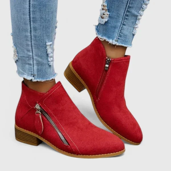 Orthopedic women's boots by Bennett and Lowe with supportive design and stylish black leather exterior.