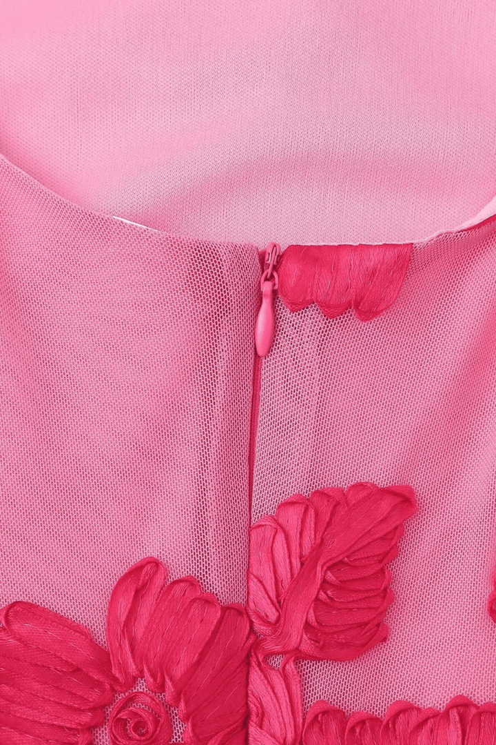 Yolanda Bennett and Lowe Amara-style maxi dress for women in flowing fabric with a floral pattern and elegant neckline.