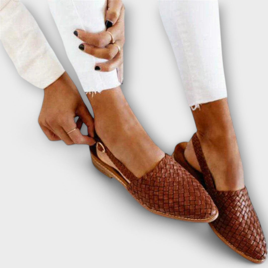 Woven Aurora Bennett and Lowe slingback loafers featuring braided design and neutral tones, stylish footwear on a white background.