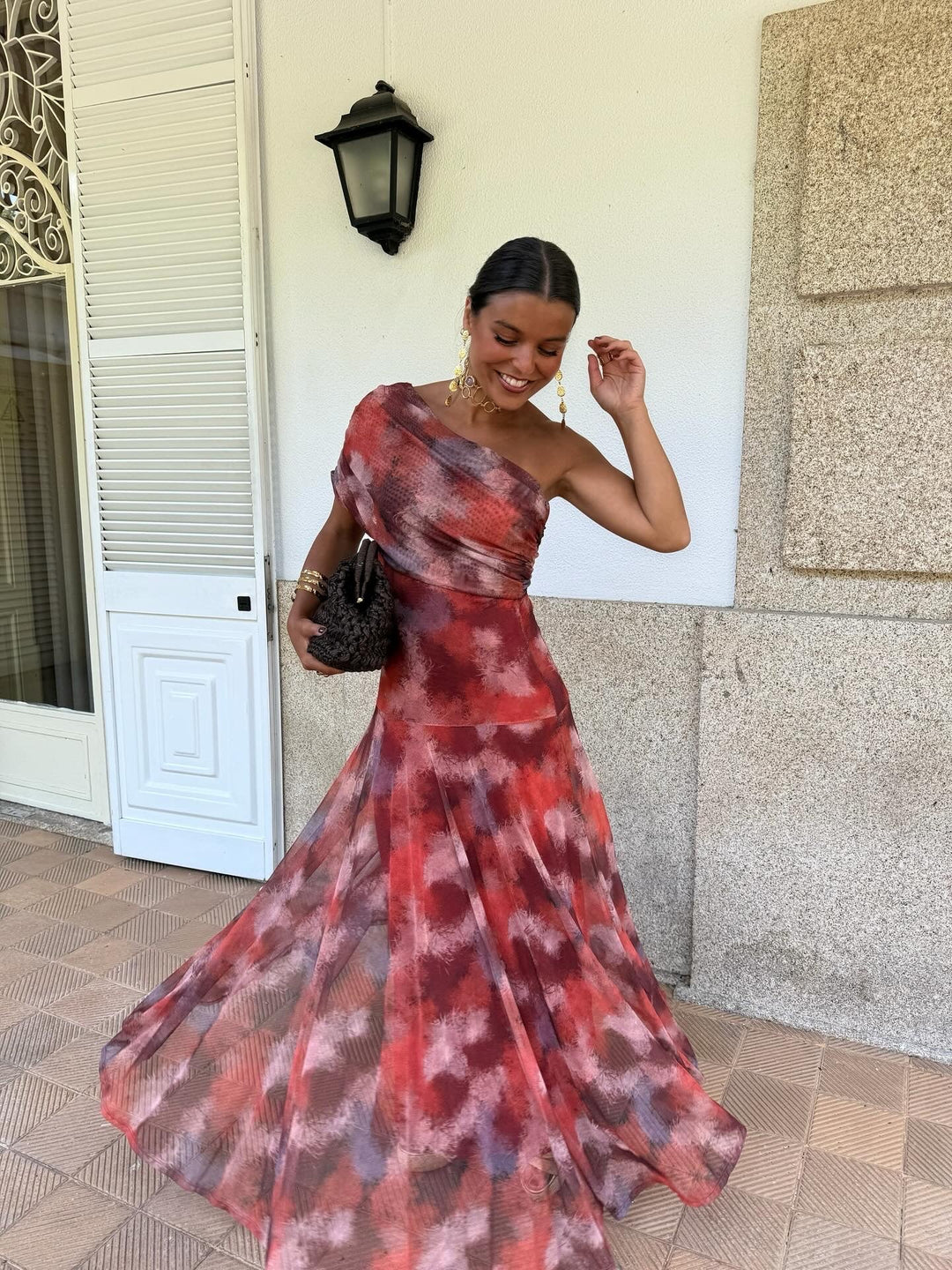 Valentina watercolor off-shoulder maxi dress for women by Bennett and Lowe, featuring a flowing, colorful watercolor design.