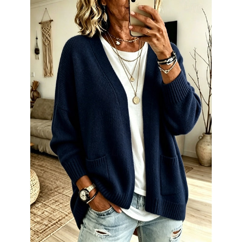 Relaxed open-front Bennett & Lowe Juliet cardigan in soft knit fabric, draped style, and neutral color on a hanger.