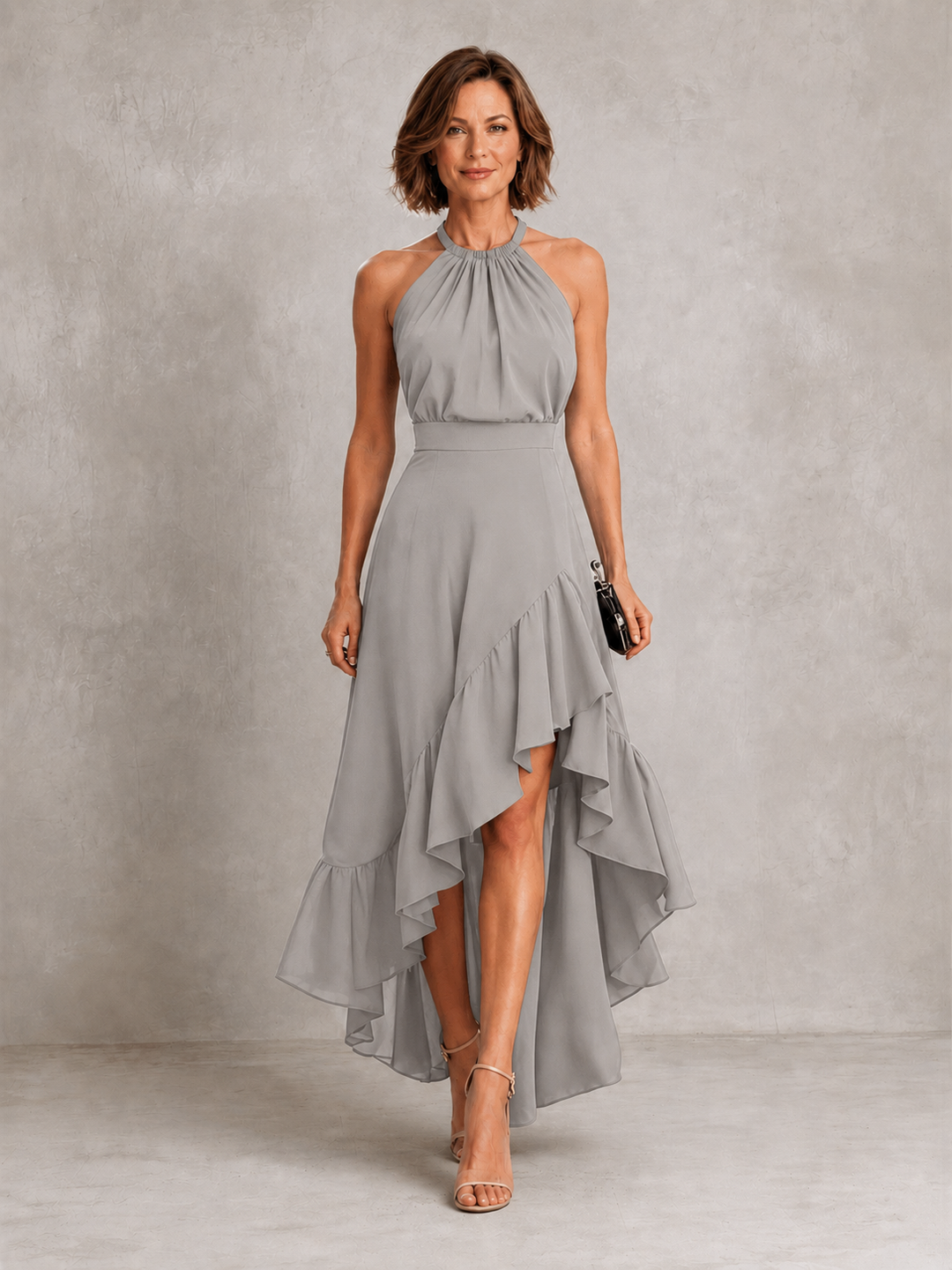 Chloe halter dress with ruffle hem by Bennett and Lowe, featuring a stylish neckline and flowing fabric for a chic look.