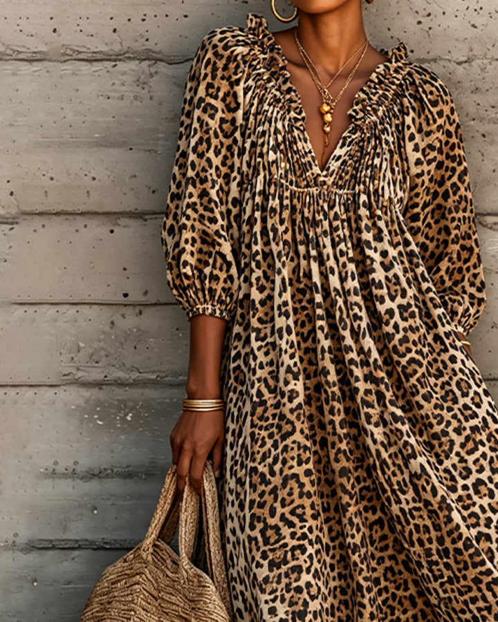Marissa leopard print V-neck maxi dress for women by Bennett and Lowe, flowing fabric with bold animal pattern.