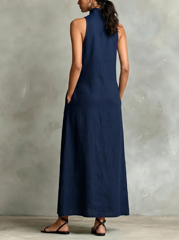 Back view of Bennett and Lowe Chrissy high-neck pocket maxi dress, flowing fabric and stylish design, on a model.