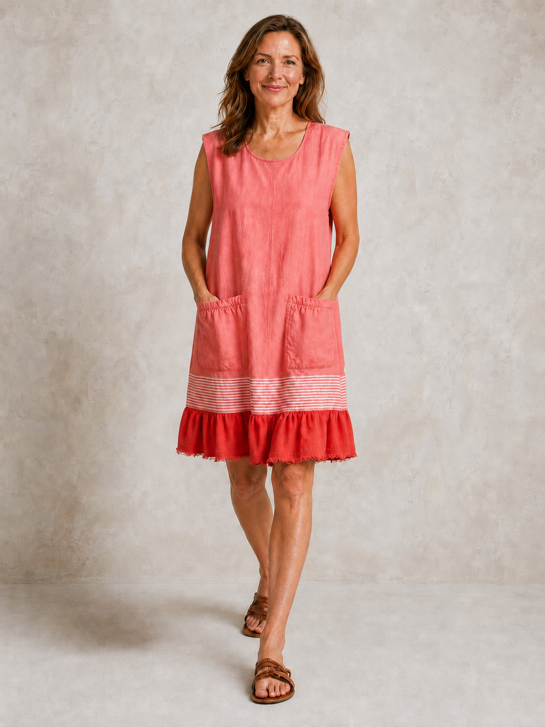 Hazel Bennett and Lowe ruffle hem tunic dress in soft fabric with flowing silhouette and stylish ruffle detail at the hem.