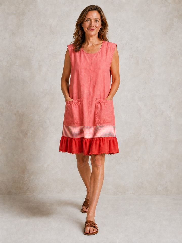 Hazel Bennett and Lowe ruffle hem tunic dress in soft fabric with flowing silhouette and stylish ruffle detail at the hem.