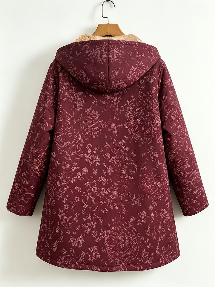 Eileen floral hooded longline coat by Bennett & Lowe, shown in a stylish coat with floral pattern and hood, longline design.