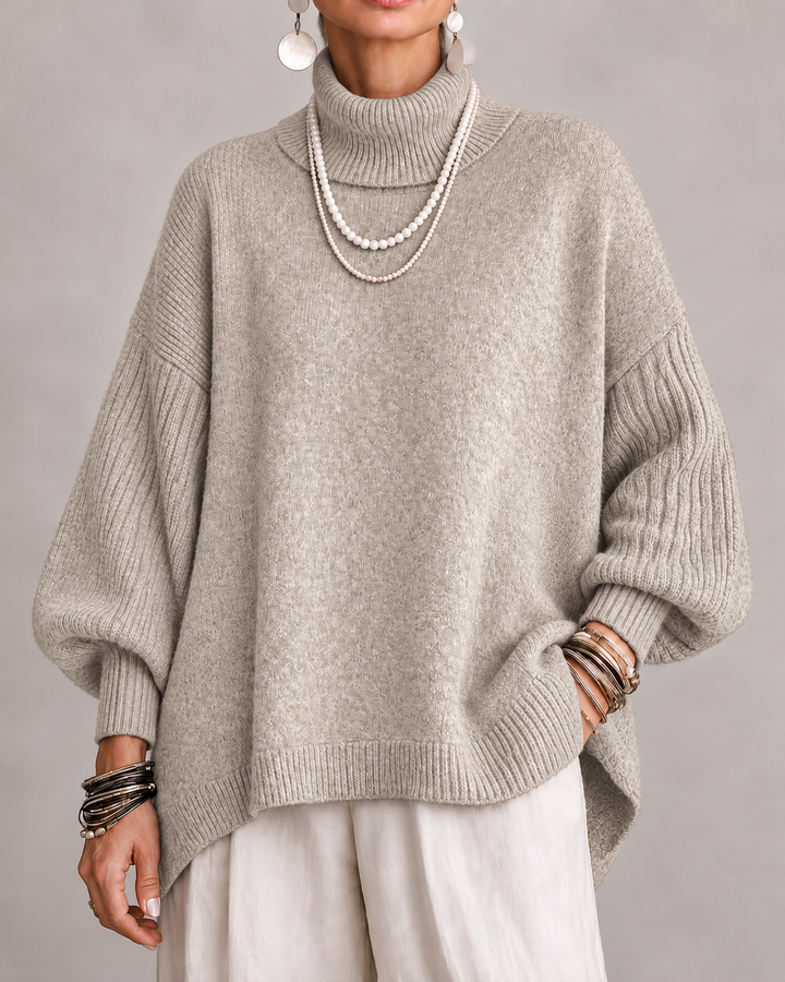 Bennett & Lowe Danielle Draped Relaxed Sweater in soft knit fabric, featuring a loose fit and draped design.