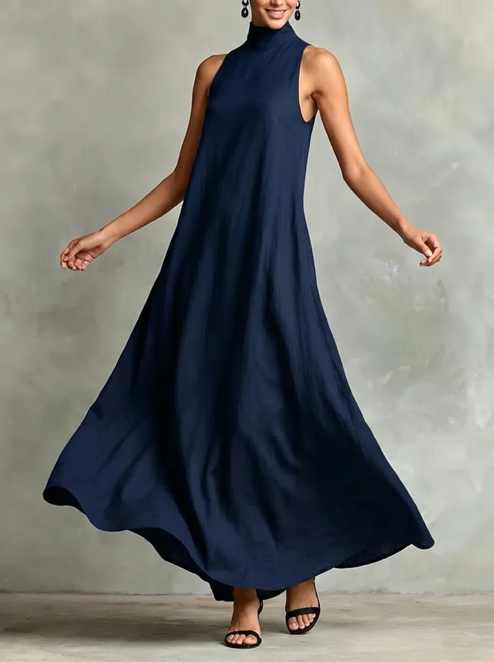 Chrissy high-neck pocket maxi dress by Bennett and Lowe, shown with a relaxed fit and side pockets in a soft fabric.