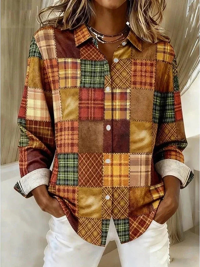 Therese patchwork button-front blouse by Bennett and Lowe, featuring colorful fabric patchwork and a classic collar.