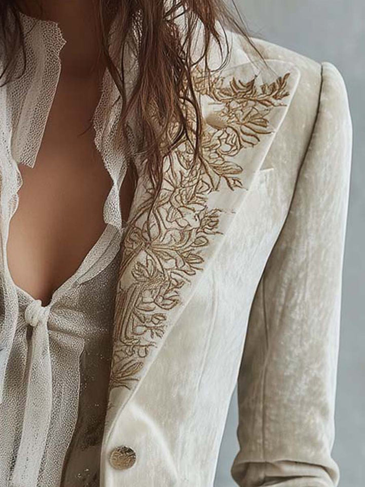 Darlene Bennett and Lowe embroidered tailored long sleeve blazer with structured fit and intricate embroidery details.