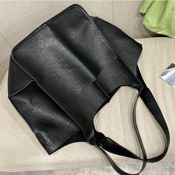 Bennett and Lowe Ruth pebbled leather tote bag with adjustable strap, showcasing its textured surface and spacious design.