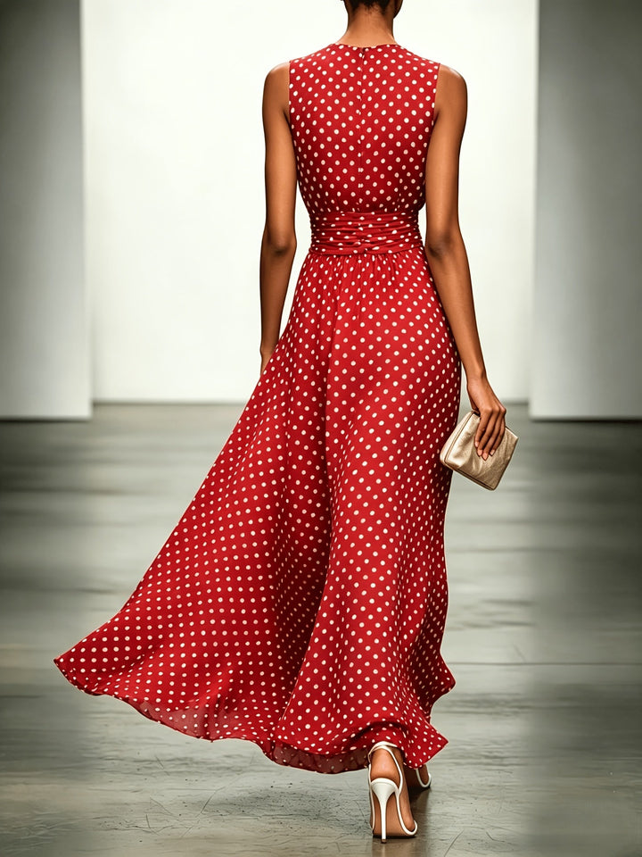 Polka dot maxi dress by Bennett and Lowe featuring a flowing silhouette and sleeveless design on a model.