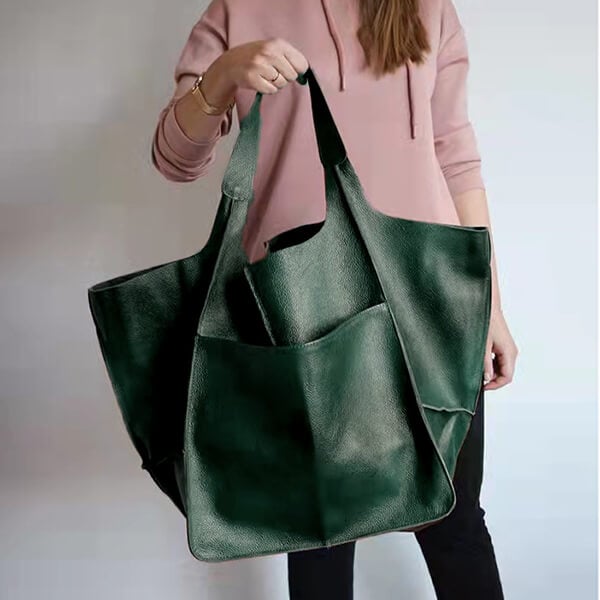 Bennett and Lowe Ruth pebble leather tote bag with adjustable strap, featuring a spacious design and textured leather surface.