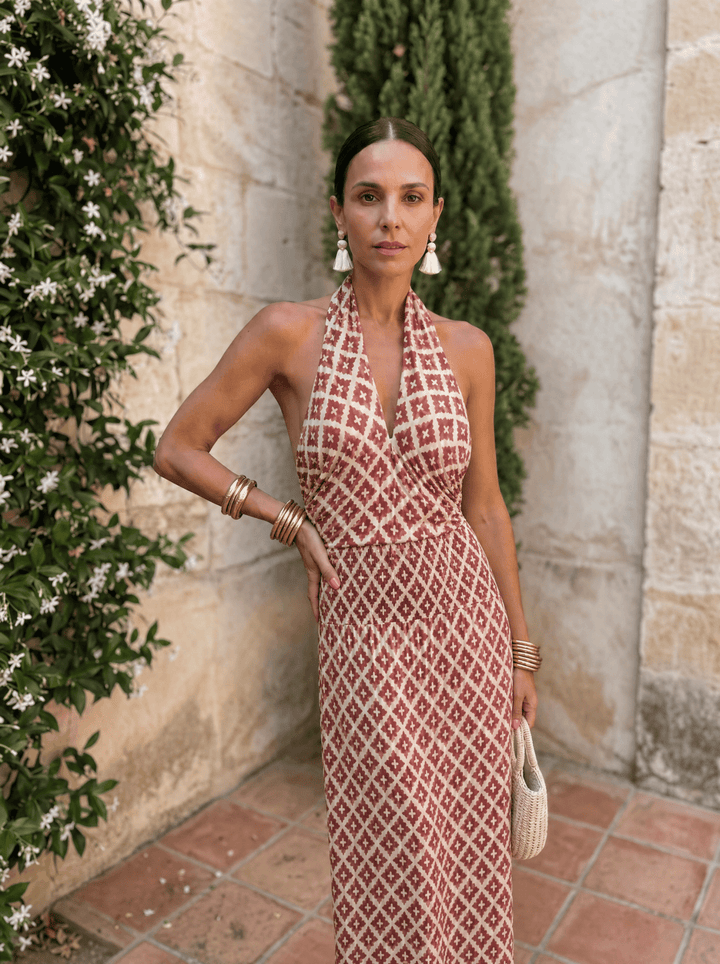 Elegant off-shoulder women's dress by Bennett and Lowe, featuring a stylish design and flowing fabric.