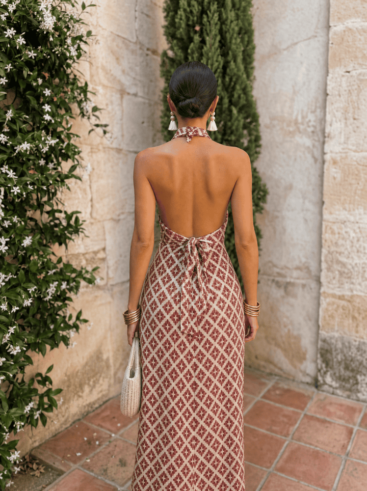Elegant off-shoulder women's dress by Bennett and Lowe, featuring a stylish design and flowing fabric.