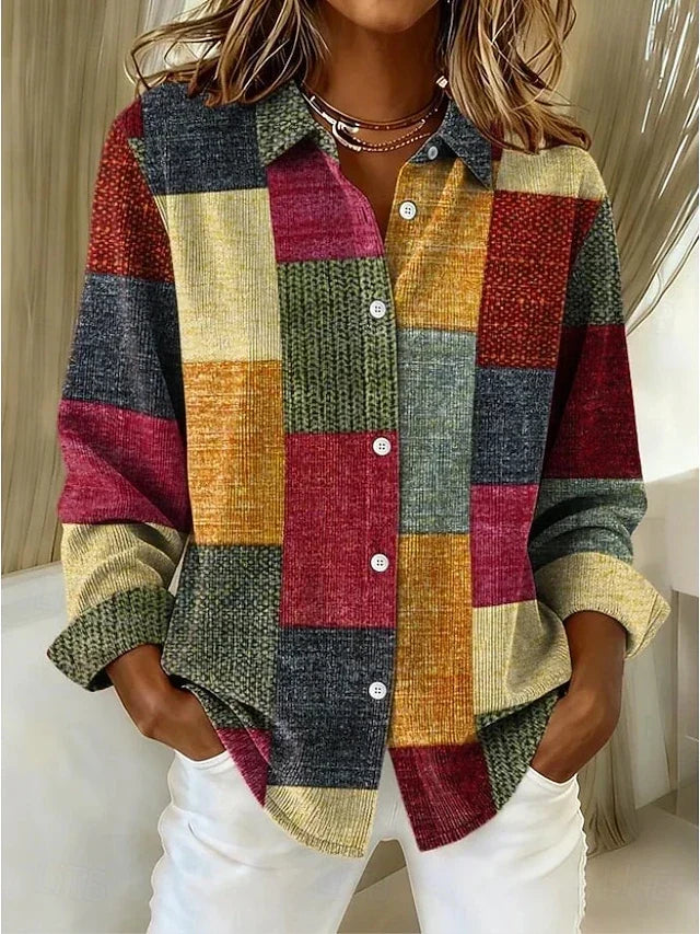 Therese patchwork button-front blouse by Bennett and Lowe, featuring colorful mixed fabric patterns and a classic collar.