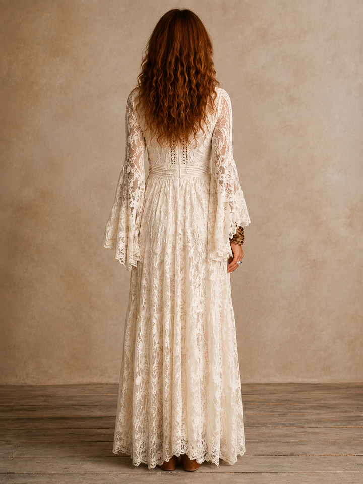 Emily vintage silhouette maxi dress by Bennett and Lowe displayed on a hanger, featuring a flowing fabric and elegant design.