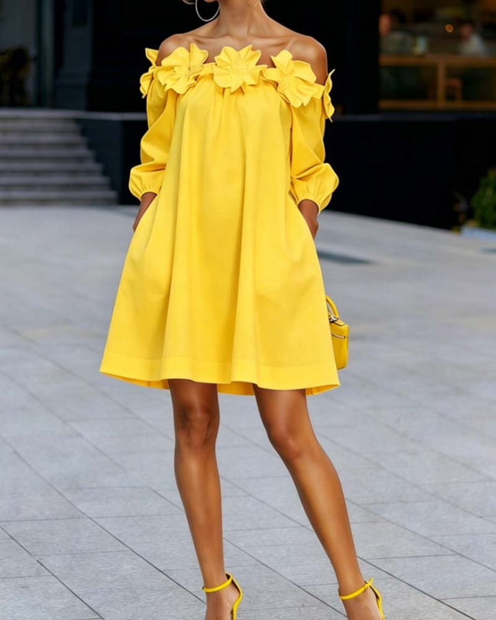 Rhoda™ off-shoulder floral appliqué dress by Bennett and Lowe, featuring a feminine design with floral details and elegant off-shoulder style.