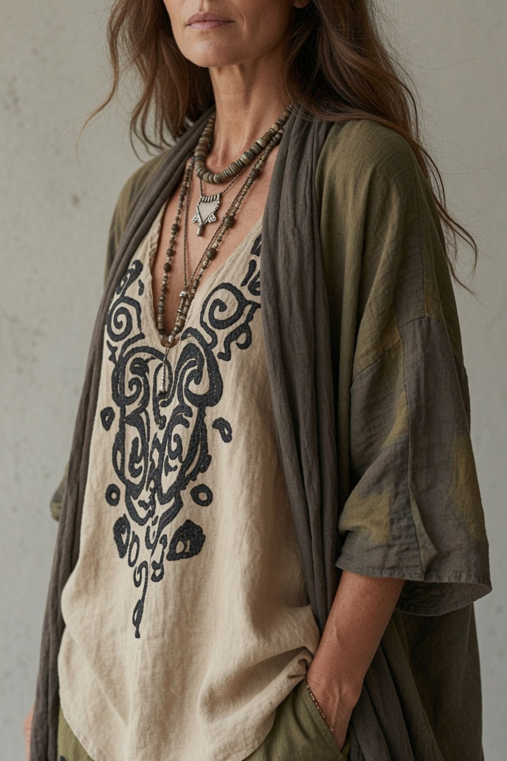 Joyce Bennett and Lowe draped three-piece set featuring a top, skirt, and blazer in elegant fabric, displayed on a model.