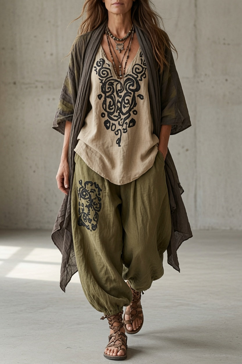 Joyce Bennett and Lowe draped three-piece set featuring coordinated fabric pieces and elegant design, shown on a mannequin.