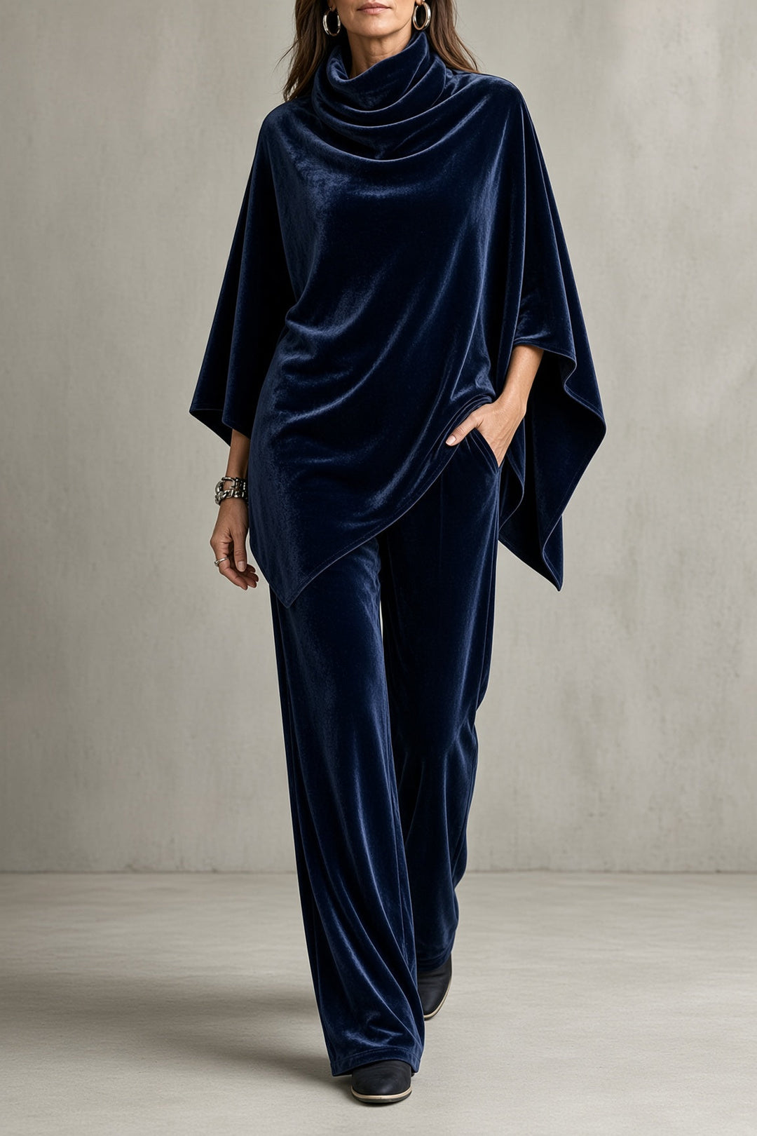 Holly two-piece set by Bennett and Lowe featuring draped fabric and stylish design, shown in a natural pose.
