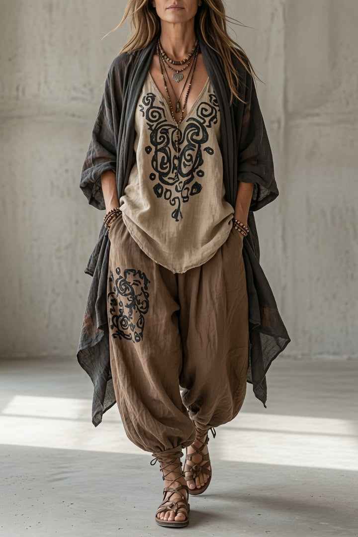 Joyce three-piece set by Bennett and Lowe, featuring a stylish draped design, with top, pants, and coordinating accessories.