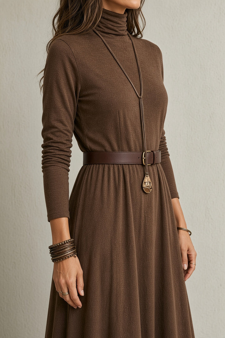 Elegant Erika lace-hem maxi dress by Bennett and Lowe featuring flowing fabric and intricate lace details.